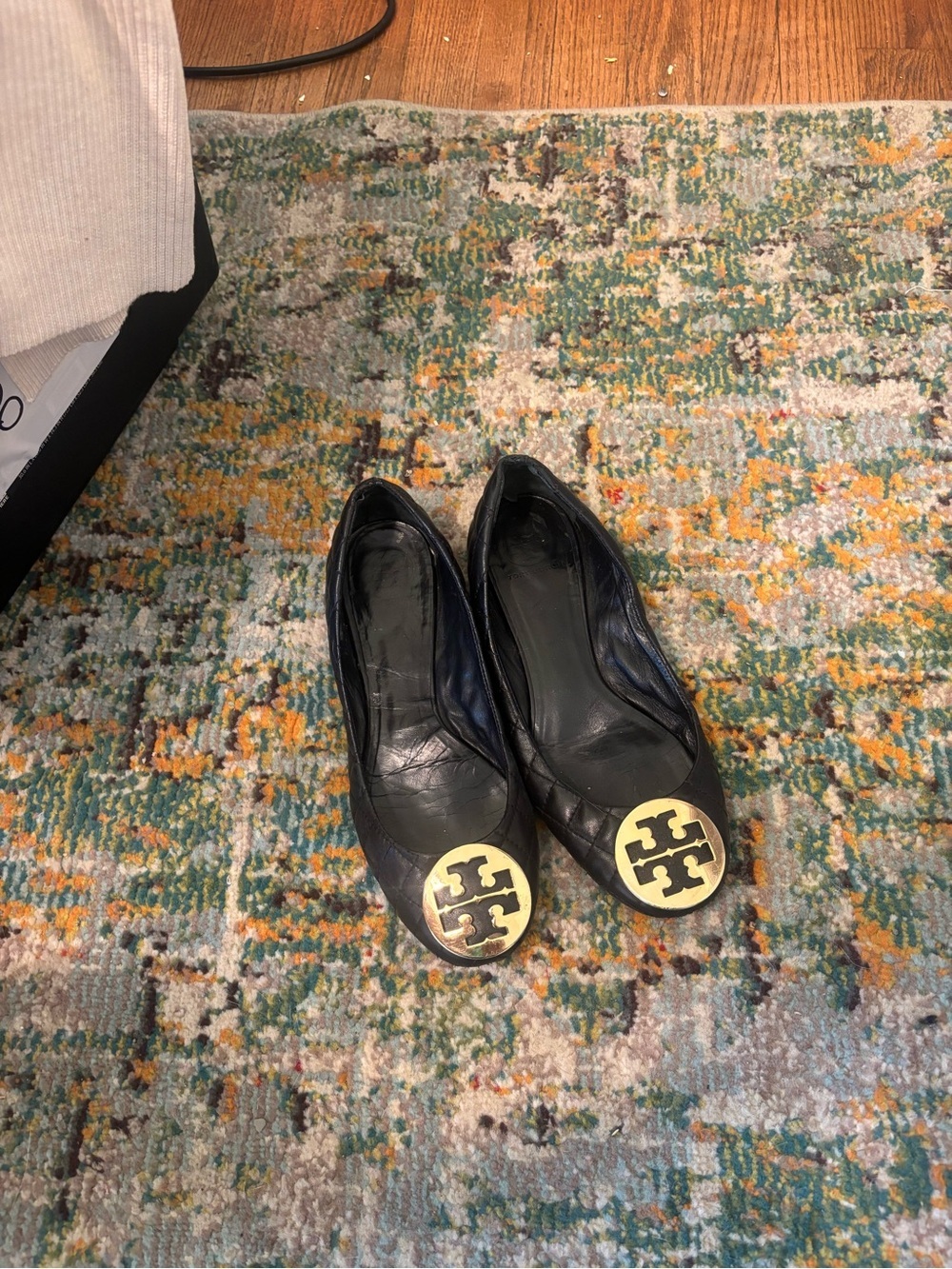 Tory Burch Black Leather Flats with Gold Logo Medallion